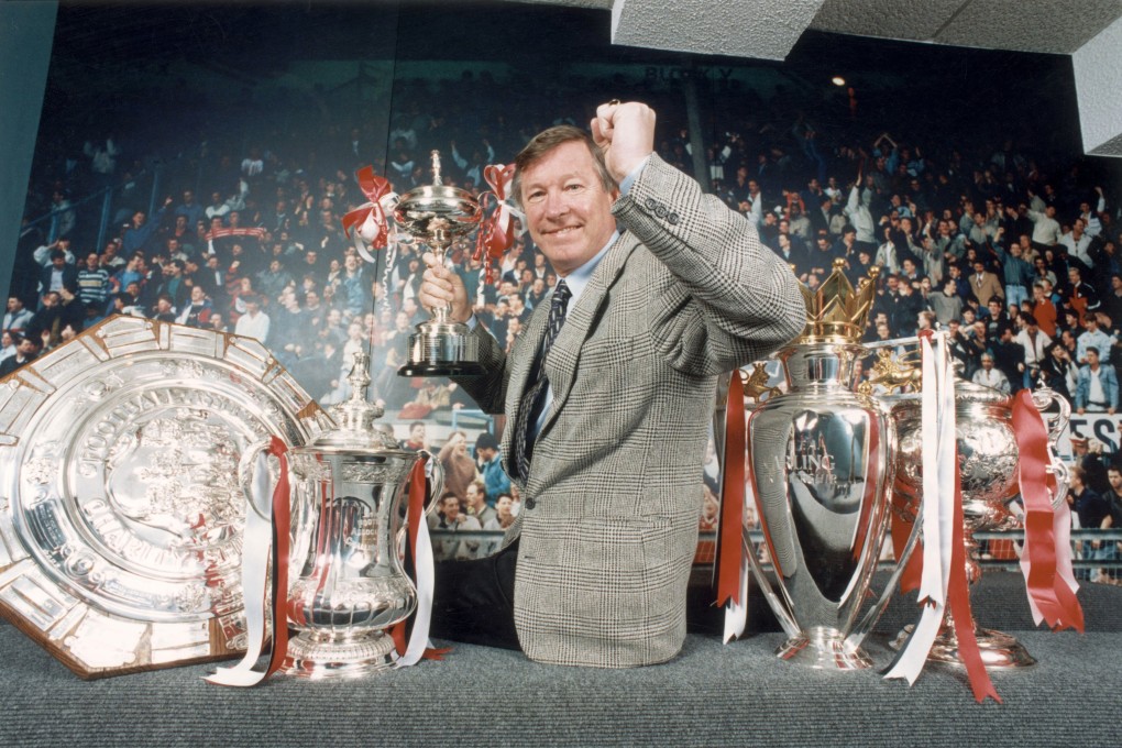 Alex Ferguson poses with the trophies Manchester United won in 1993-94. Ashley Westwood was a youth player at United at the time. Photo: Getty Images