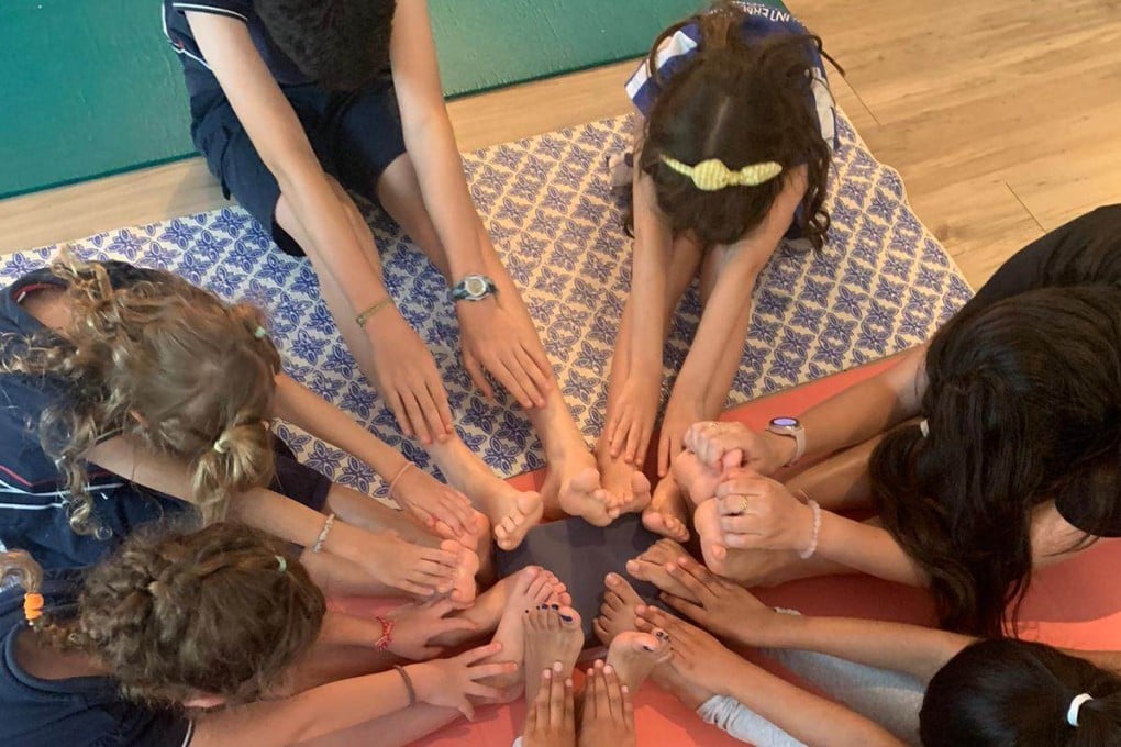 At OmSkool Yoga in Hong Kong, Alison Drake makes classes fun through themes, songs, games and discussion. Photo: courtesy of Alison Drake
