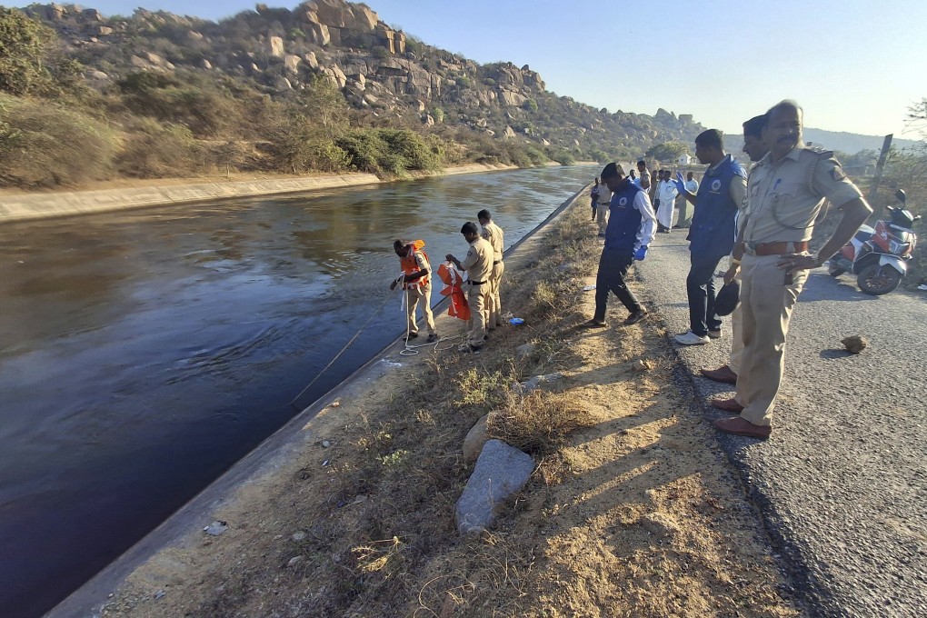 Police search for the male companions who were pushed into a canal by three men accused of gang-raping two women in Koppal, India’s Karnataka state, on March 7. Photo: AP