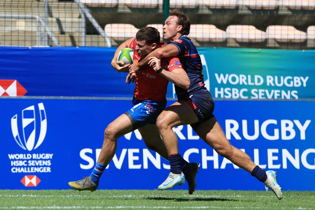 Harry Sayers (right) grapples with Nicolas Garafulic during Hong Kong’s loss to Chile. Photo: Reuters