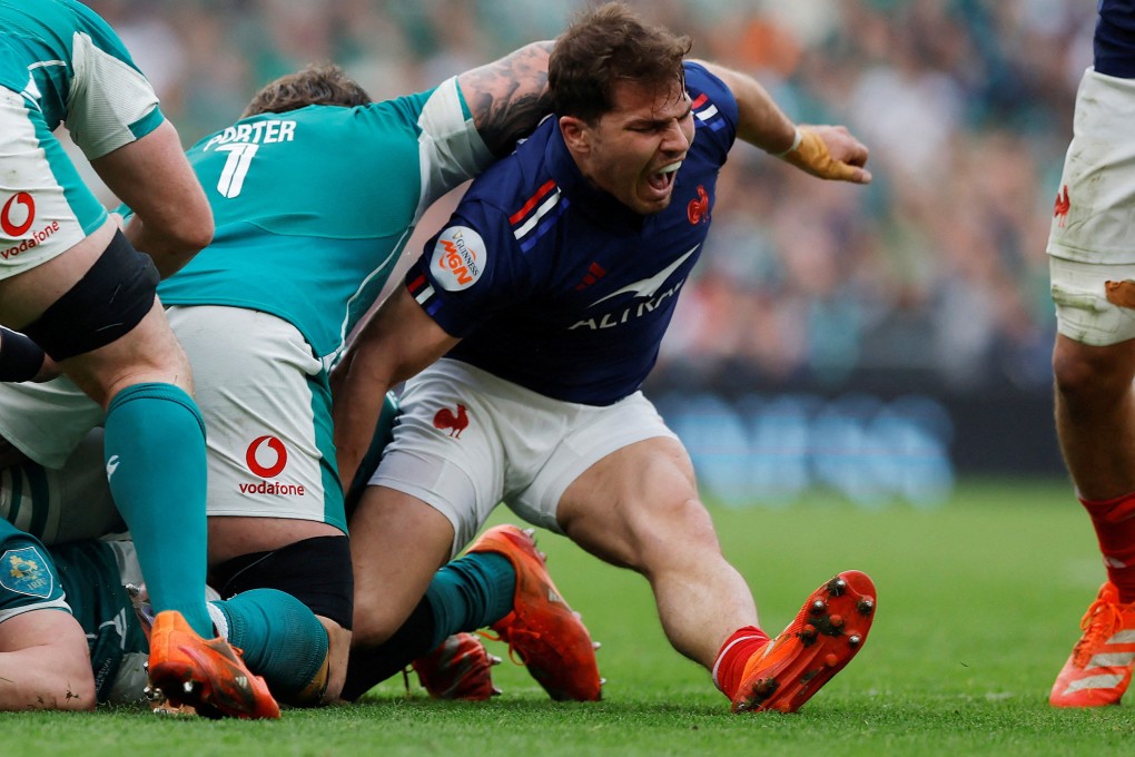 France’s Antoine Dupont cries out as he suffers a knee injury during his side’s win over Ireland. Photo: Reuters