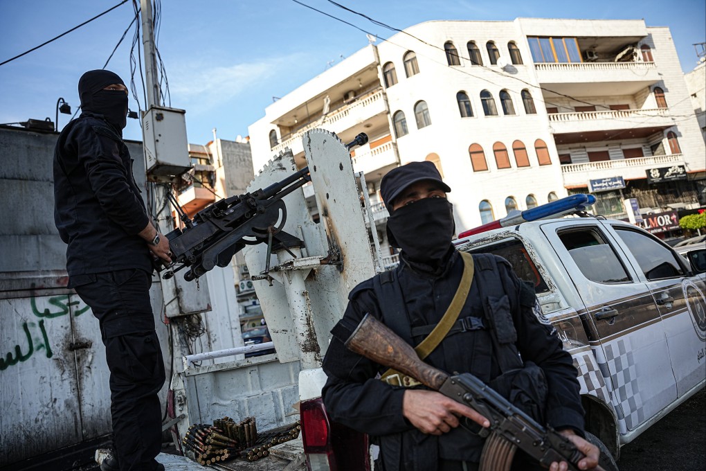 Syrian security forces at a checkpoint in Latakia, Syria, on Saturday. Photo: EPA-EFE