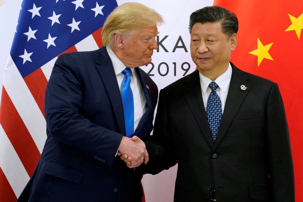 US President Donald Trump and China’s President Xi Jinping shake hands ahead of their bilateral meeting during the G20 leaders summit in Osaka, Japan in June 2019. Photo: Reuters