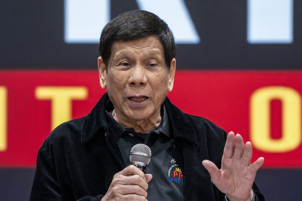 Former president of the Philippines Rodrigo Duterte speaks inside the Southorn Stadium during a thanksgiving gathering organised by Hong Kong-based Filipino workers in Hong Kong on March 9. Photo: AP