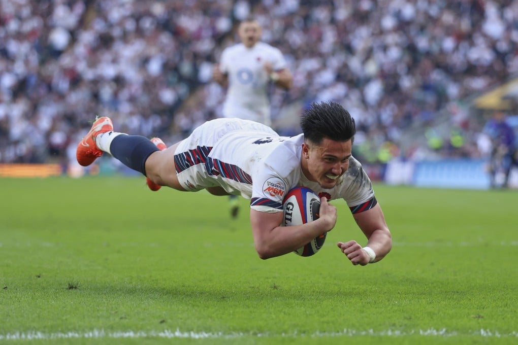 England’s Marcus Smith scores the try that gave England a bonus point in their win over Italy. Photo: AP