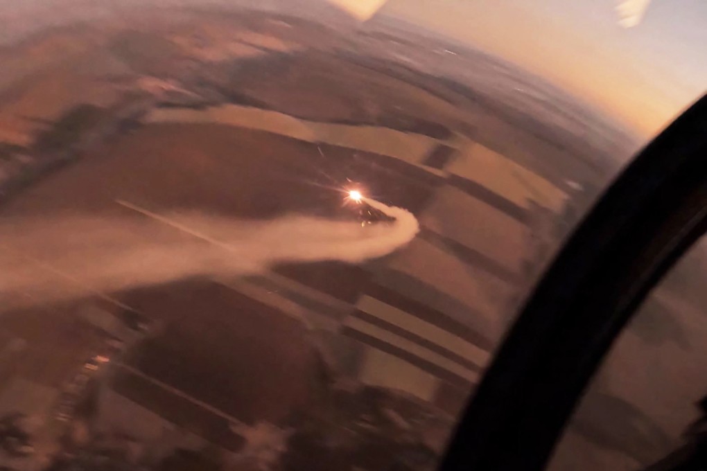 A French-made Mirage-2000 fighter jet shoots down a Russian KH-101 cruise missile as seen from the cockpit at an undisclosed location in Ukraine. Photo: Air Forces of Ukraine via AFP