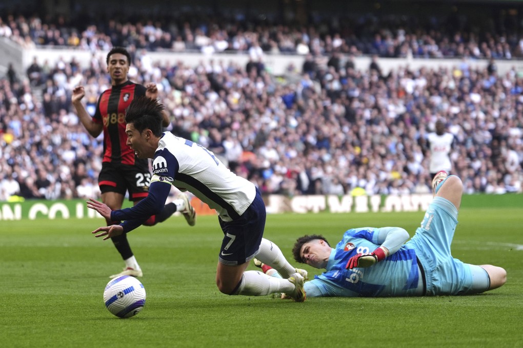 Bournemouth goalkeeper Kepa Arrizabalaga (right) brings down Son Heung-Min, resulting in a penalty kick for Spurs, in their match at the Tottenham Hotspur Stadium on Sunday. Photo: AP