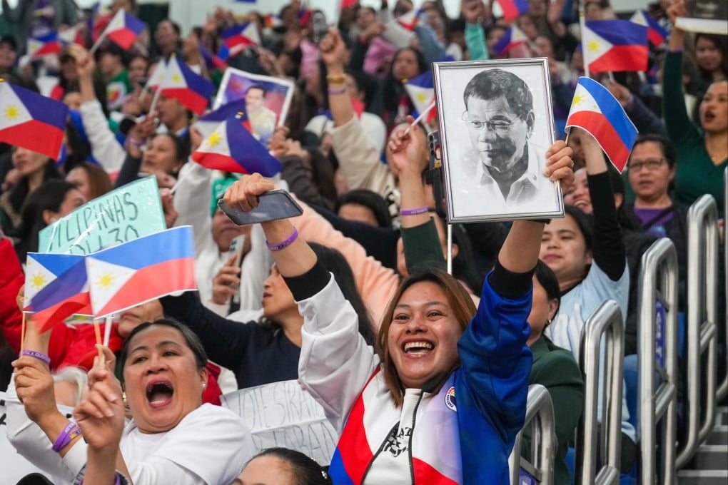 The ex-Philippine president delivered an emotionally charged speech at Southorn Stadium in Wan Chai on Sunday at the event for Filipino workers. Photo: Sam Tsang