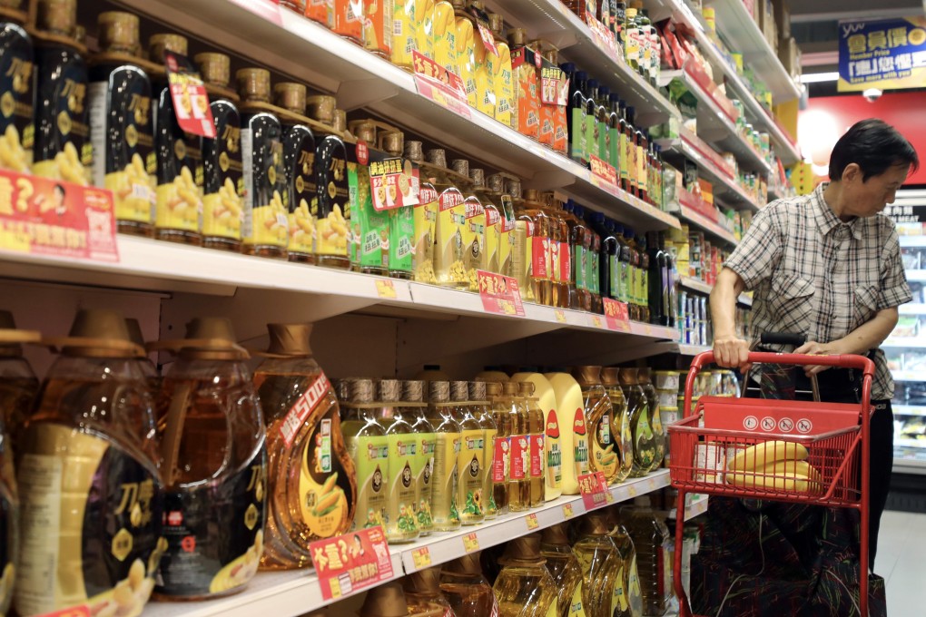 Cooking oil is seen for sale at a supermarket in Sheung Shui, Hong Kong. Photo: Xiaomei Chen