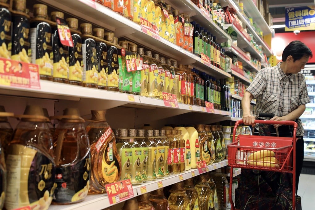 Cooking oil is seen for sale at a supermarket in Sheung Shui, Hong Kong. Photo: Xiaomei Chen