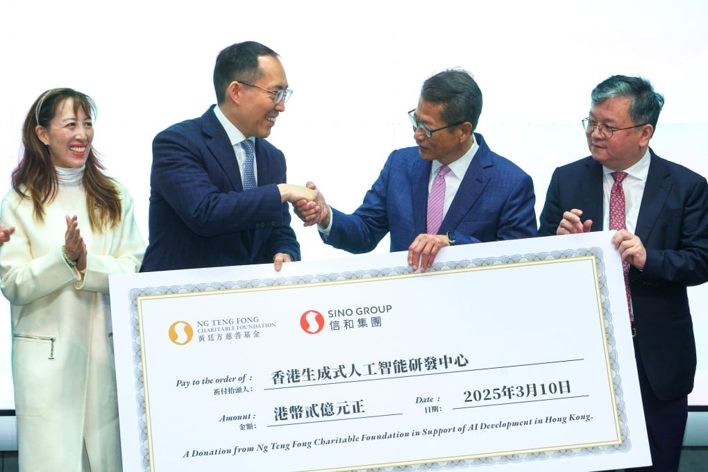 Finance chief Paul Chan (third from left) accepts the donation from the Ng Teng Fong Charitable Foundation and Sino Group. Photo: Dickson Lee