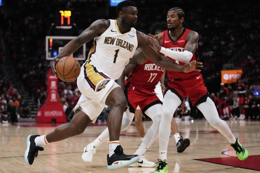 New Orleans Pelicans forward Zion Williamson (left) controls the ball against Houston Rockets guard Jalen Green during their NBA clash in Houston last week. Photo: AP