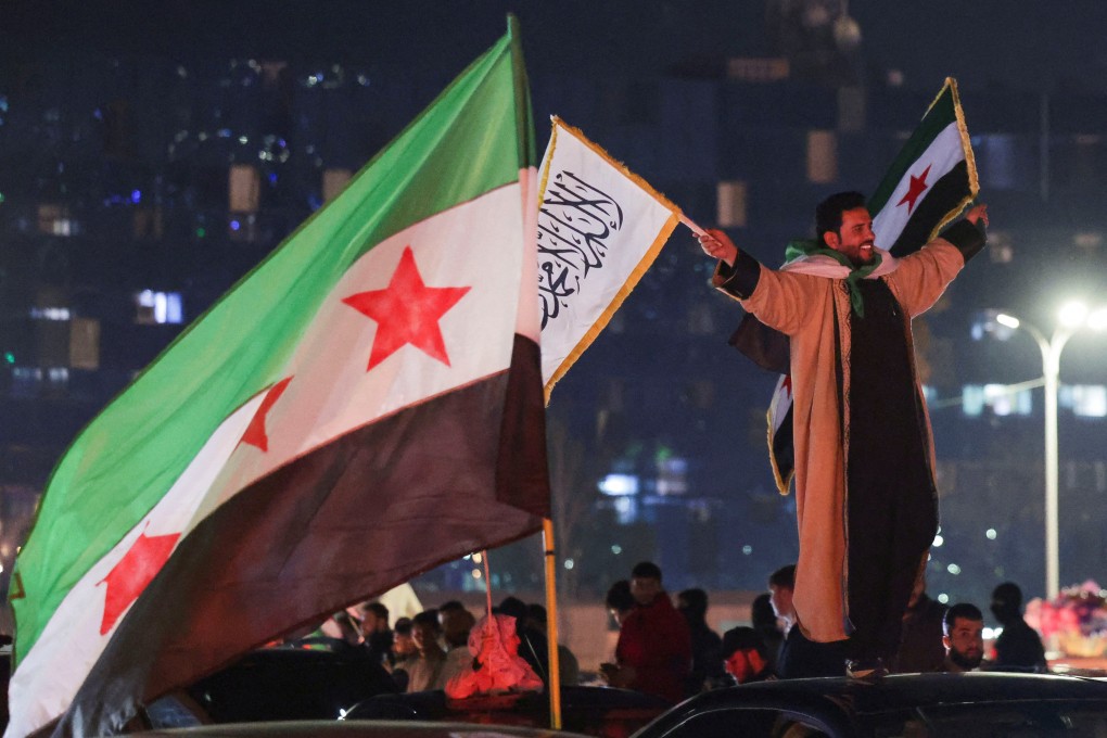 People celebrate after the Kurdish-led and US-backed Syrian SDF signed a deal agreeing to integrate into Syria’s new state institutions. Photo: Reuters