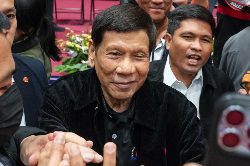Former Philippine president Rodrigo Duterte speaks to Filipino workers at an event in Hong Kong on Sunday. Photo: Sam Tsang