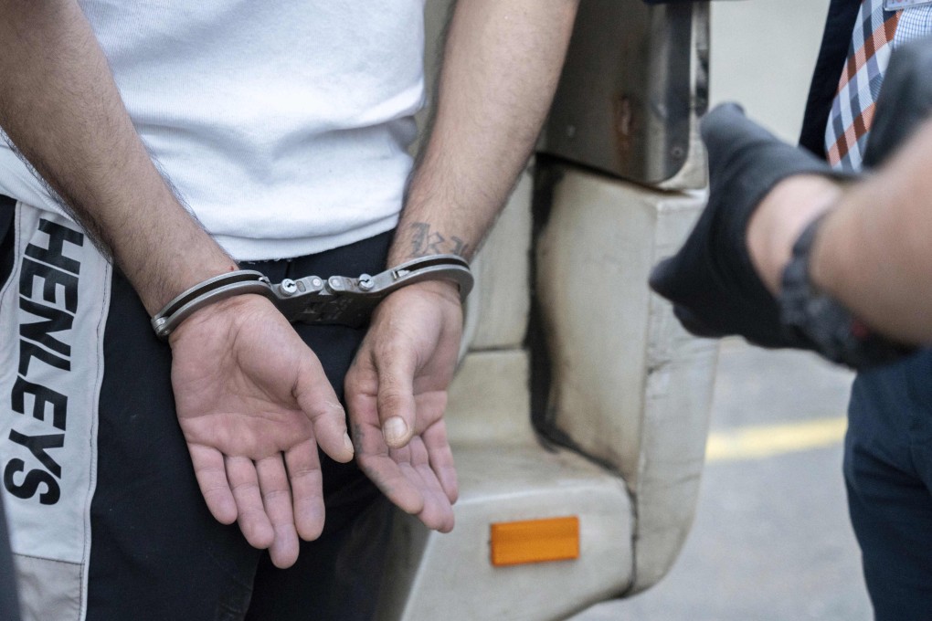 A man is arrested in Sydney on Monday following a months-long wave of antisemitic crimes in Australia. Photo: New South Wales Police via AP