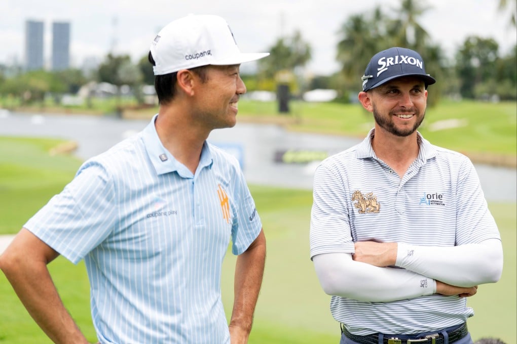 John Catlin (left) alongside Iron Heads captain Kevin Na on the 18th green after winning the LIV Golf Singapore qualifier at Sentosa Golf Club. Photo: LIV Golf