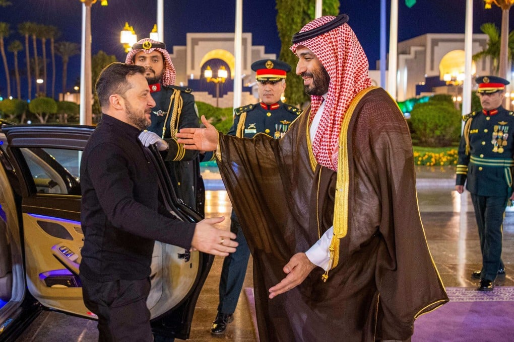 Saudi Crown Prince Mohammed bin Salman greeting Ukraine’s President Volodymyr Zelensky. Photo: Saudi Press Agency via AFP