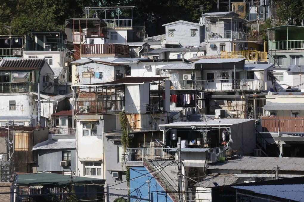 General view of Pokfulam Village. Half of the more than 60,000 village houses inspected have unauthorised structures, but authorities plan to give owners with minor illegal additions a grace period before ordering removal work due to the huge volume of cases. Photo: Jonathan Wong