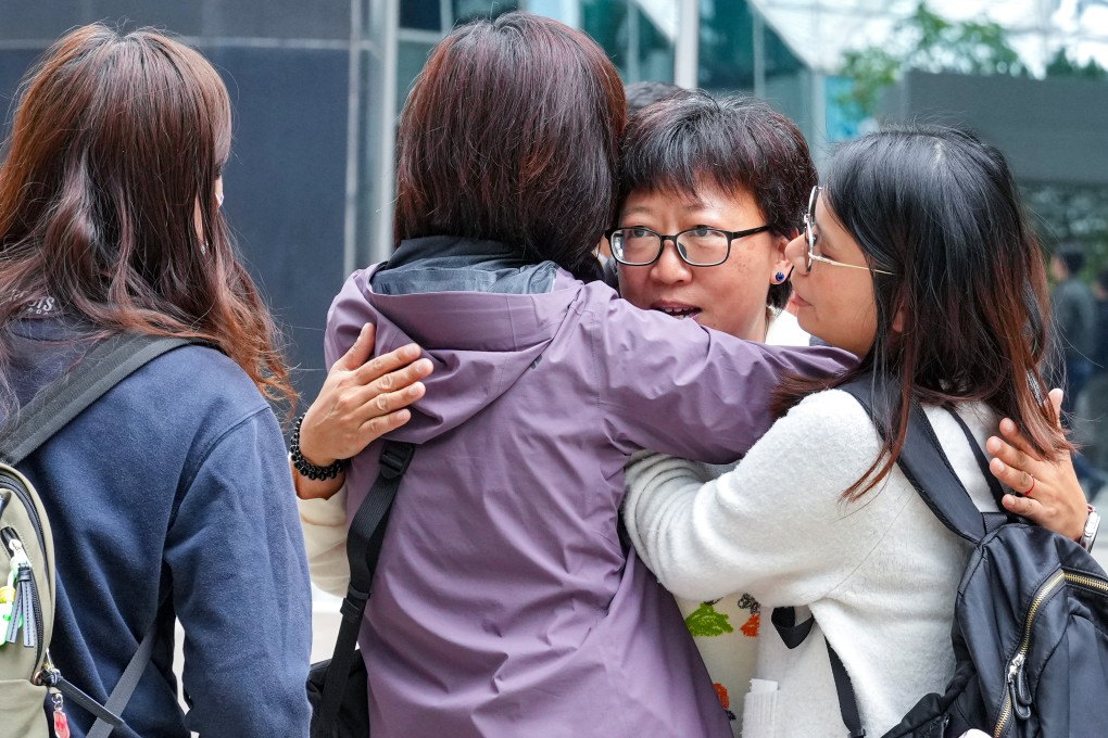 Social worker Jackie Chen arrives at the Hong Kong District Court to hear the verdict on her retrial, and is greeted by supporters. Photo: May Tse