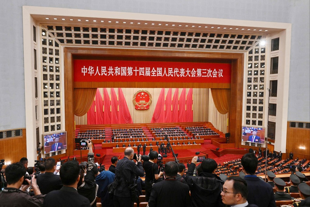Chinese president Xi Jinping attends the closing ceremony of the National Peoples Congress (NPC) at the Great Hall of the People in Beijing on March 11. Photo: AFP