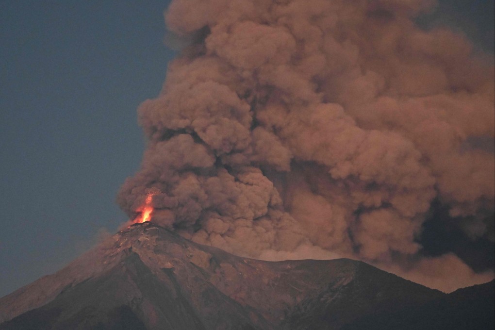 The volcano spewed gas and ash far into the sky Monday. Photo: AFP
