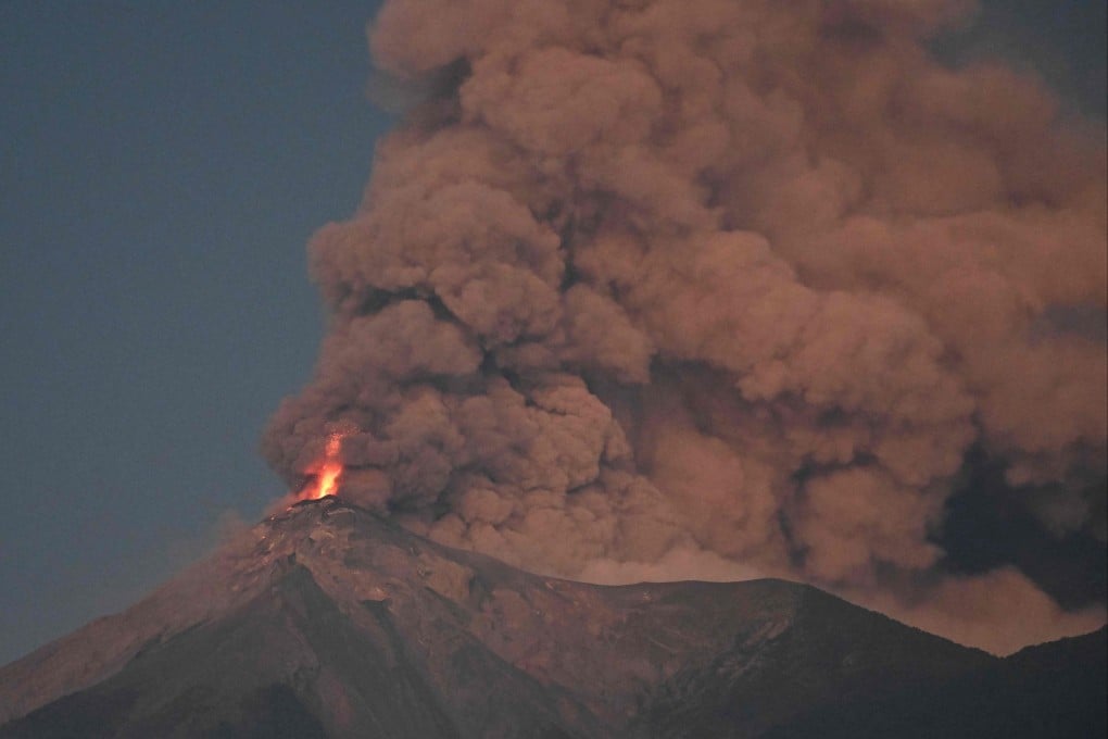 The volcano spewed gas and ash far into the sky Monday. Photo: AFP