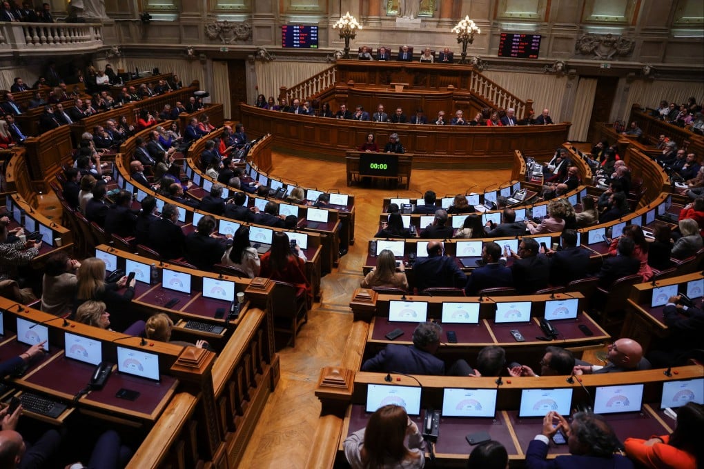 Parliament lawmakers vote against the government confidence motion in Lisbon, Portugal. Photo: Reuters