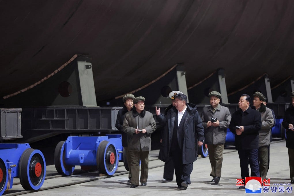North Korea’s leader Kim Jong-un inspects a nuclear submarine during a visit to a shipyard, in this photo released by North Korea’s official Korean Central News Agency on March 8. Photo: KCNA via Reuters