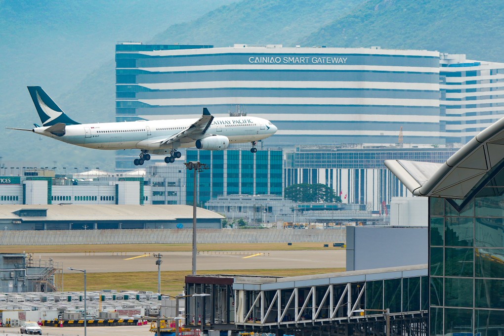 A Cathay Pacific plane lands at Hong Kong airport. Photo: May Tse