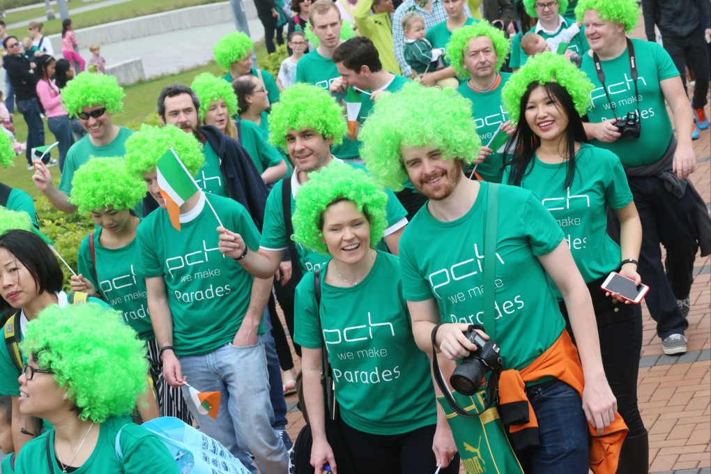 People attend a parade celebrating  St Patrick’s Day in Central on March 15, 2015. Photo: David Wong