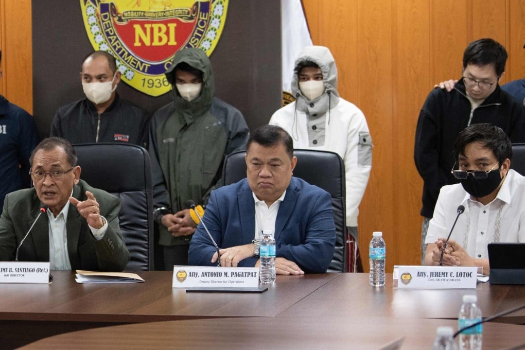Chinese nationals and their alleged Philippine accomplices, arrested for alleged espionage, are presented during a press conference at the National Bureau of Investigation office in Manila on February 25. Photo: AFP