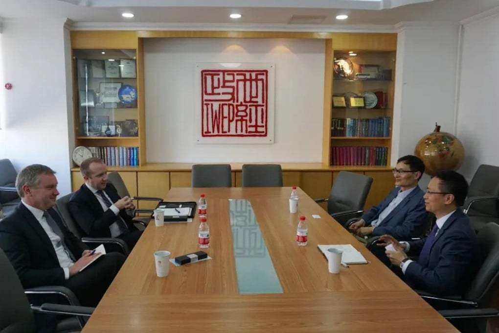 Oliver Melton, the US Treasury Department’s outgoing finance attaché in China, and his successor Tyler Makepeace speak to Zhang Bin and Xu Qiyuan of the Institute of World Economics and Politics on Wednesday. Photo: Handout