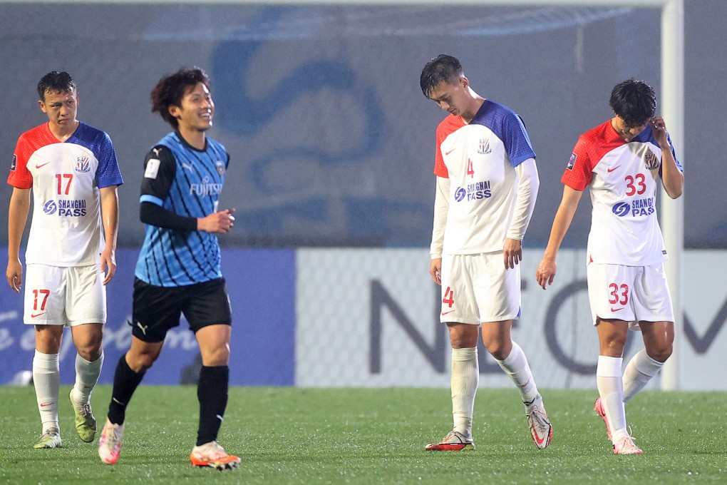 Shanghai Shenhua players (in white, from left) Gao Tianyi, Jiang Shenglong and Wang Haijian react after their 4-1 aggregate defeat to Japan’s Kawasaki Frontale in Kawasaki. Photo: Xinhua