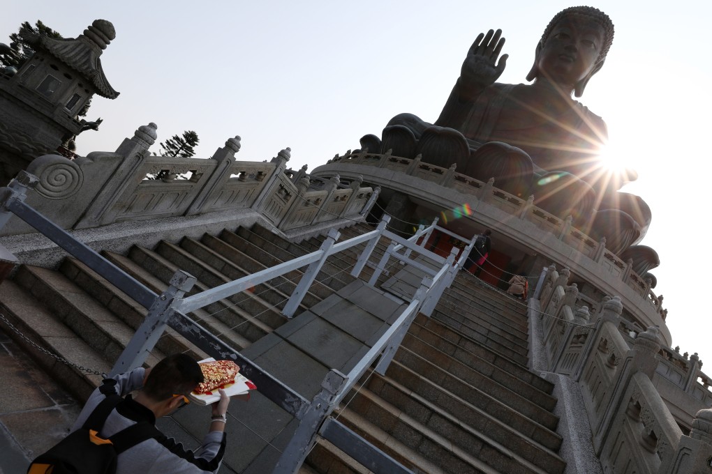 Follow in the footsteps of The Amazing Race teams when they visited Hong Kong, from the Big Buddha (pictured) to a night market. Photo: Nora Tam