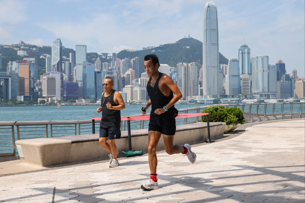 People jog at the Tsim Sha Tsui waterfront in May 2021. Hong Kong has seen significant improvements in running routes in the past few years on both sides of Victoria Harbour. Photo: Dickson Lee