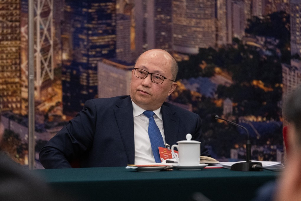 Zheng Yanxiong, director of the Hong Kong Liaison Office, attends the Hong Kong delegation group meeting at The Third Session of the 14th National People’s Congress of China in Beijing on March 7. Photo: EPA-EFE