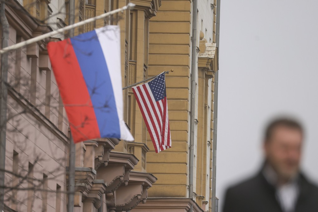 Russian and US flags hanging from the main building of the US embassy in Moscow. Photo: EPA-EFE