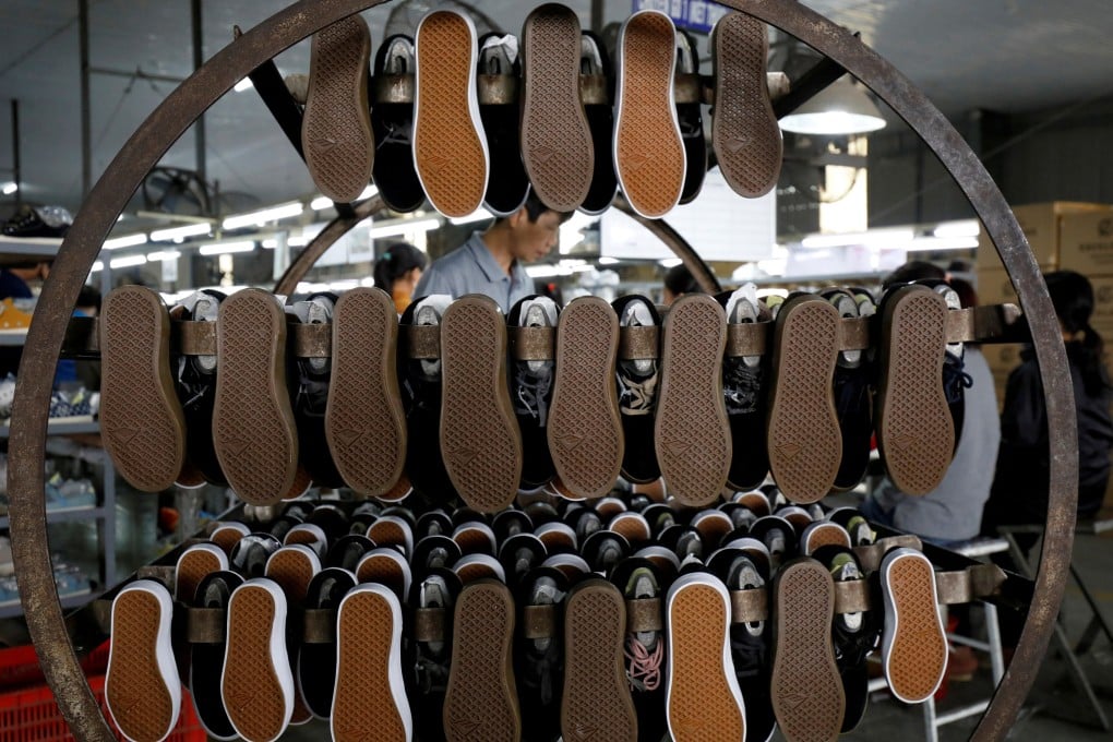 Shoes for export at a shoe factory in Hanoi, Vietnam. Photo: Reuters