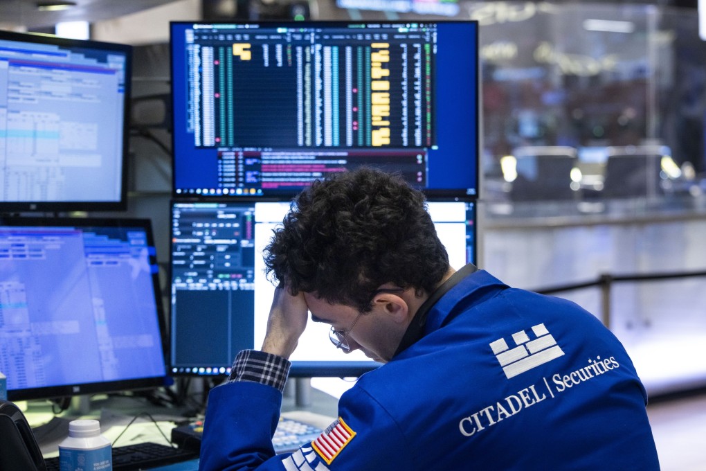A trader works on the floor of the New York Stock Exchange on Tuesday. Photo: EPA-EFE