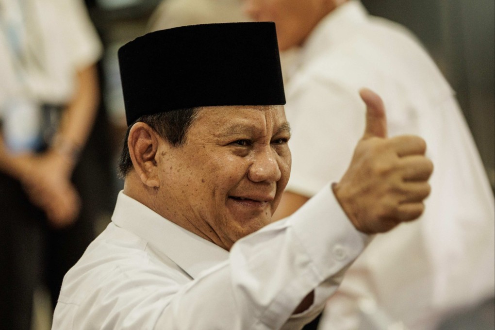 Indonesia’s President Prabowo Subianto gestures at the launch of a new system for directly transferring allowances to regional public school teachers’ bank accounts in Jakarta on March 13. Photo: AFP
