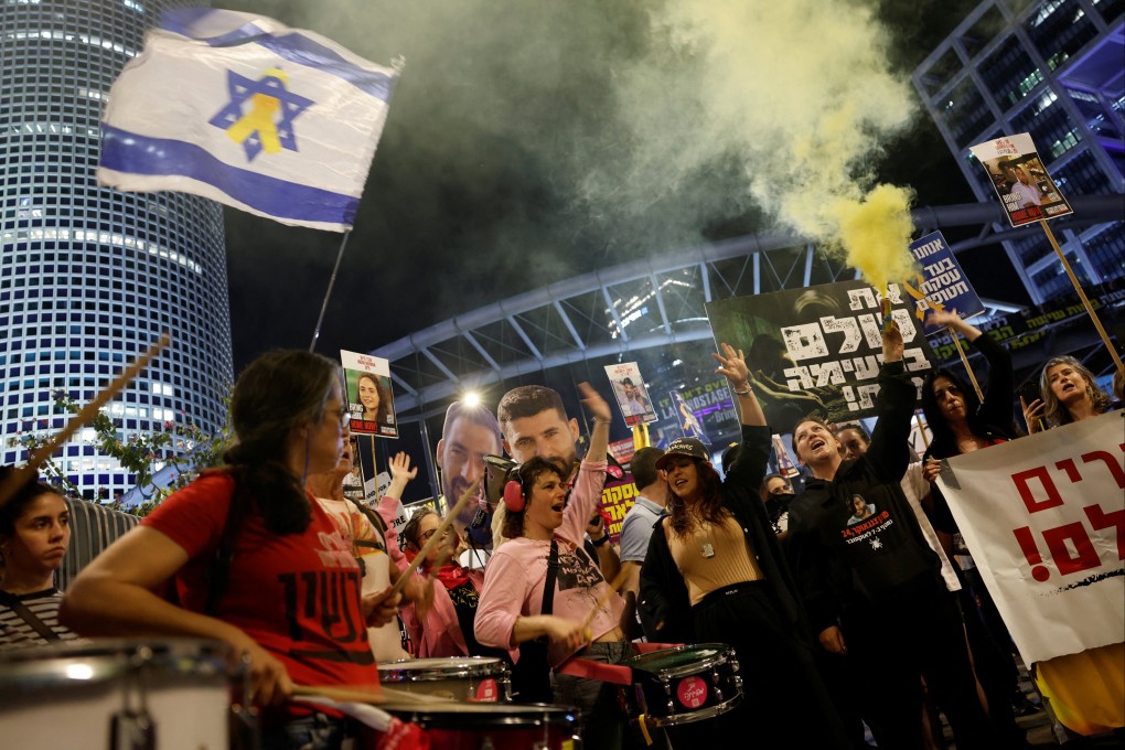 Relatives and supporters of kidnapped Israeli hostages protest to demand the release of all hostages, in Tel Aviv, on March 13, 2025. Photo: Reuters