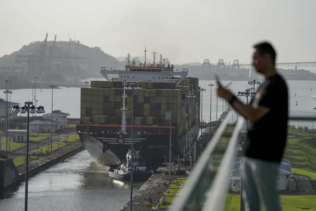 A cargo ship goes through the Panama Canal. Photo: AP