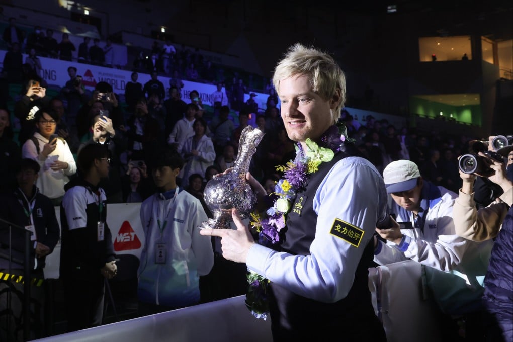 Neil Robertson with the World Grand Prix trophy at Kai Tak Arena. Photo: Dickson Lee