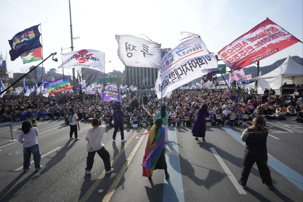 Protesters stage a rally calling for impeached South Korean President Yoon Suk-yeol to step down, in Seoul on Saturday. Photo: AP