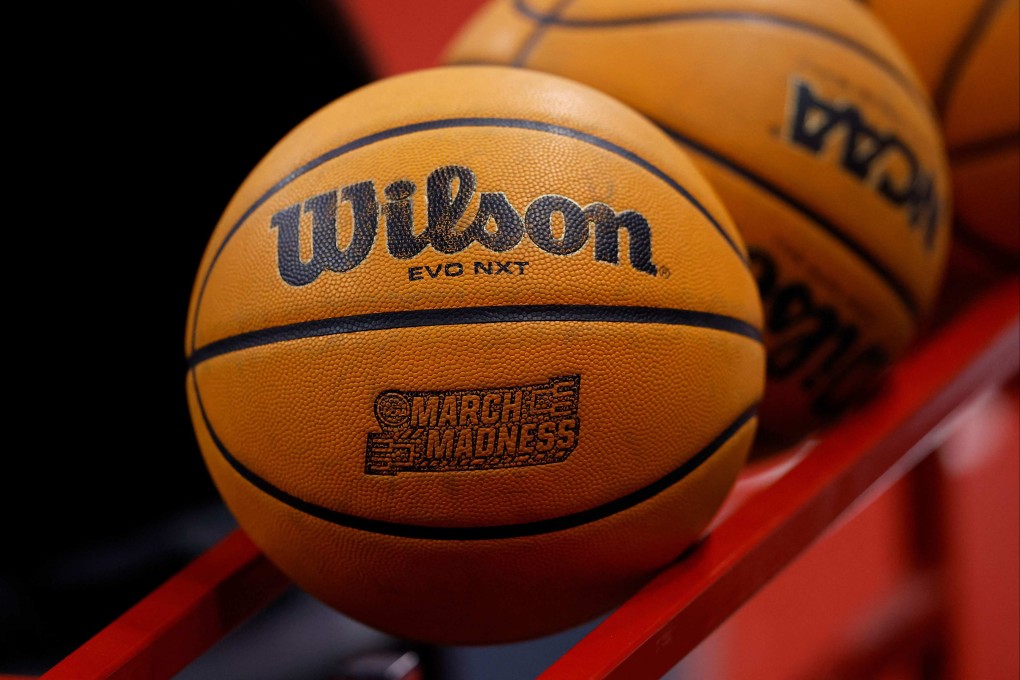 A Wilson basketball with the March Madness logo before the game between the Wisconsin Badgers and Penn State Nittany Lions at Kohl Center in early March. Photo: AFP