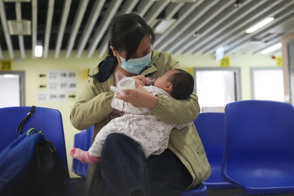 A woman takes care with her newborn baby at Yaumatei Maternal and Child Health Centre in Yau Ma Tei on February 18. Photo: Sam Tsang