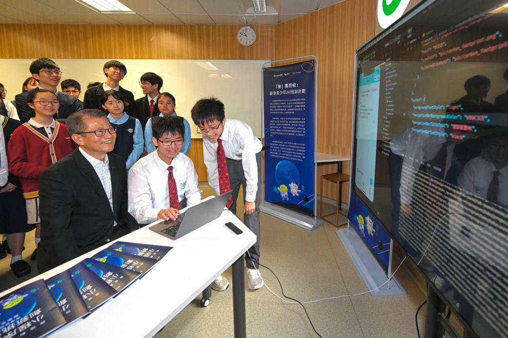 Financial Secretary Paul Chan (front, left) has expressed hope that more companies will develop young talent in the city. Photo: Handout