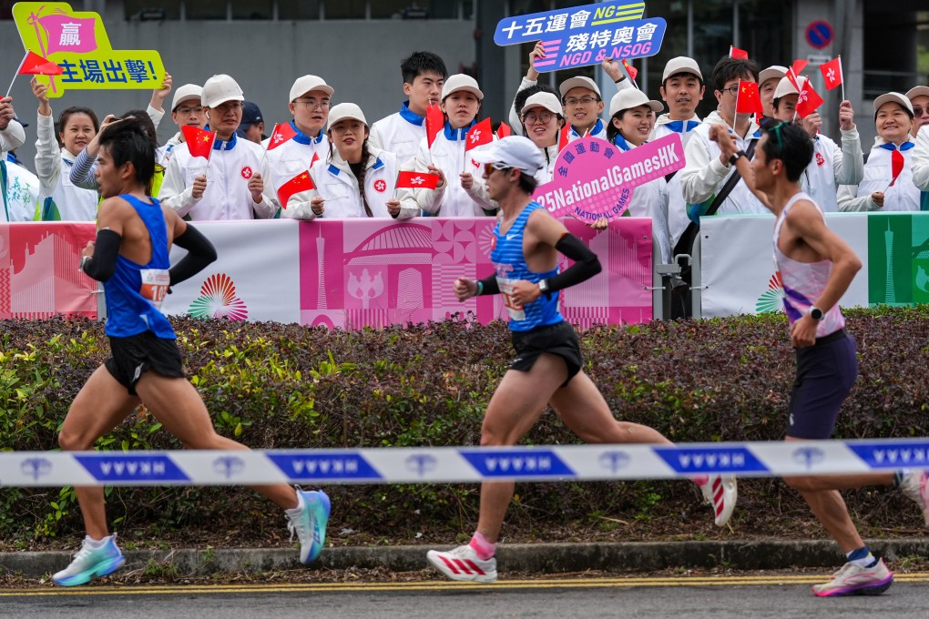 Athletes are cheered on during a marathon test event in February. Photo: Eugene Lee