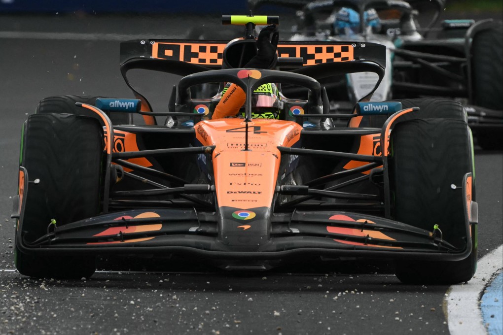 McLaren driver Lando Norris waves to the crowd after winning the Australian Formula One Grand Prix at Albert Park. Photo: AFP