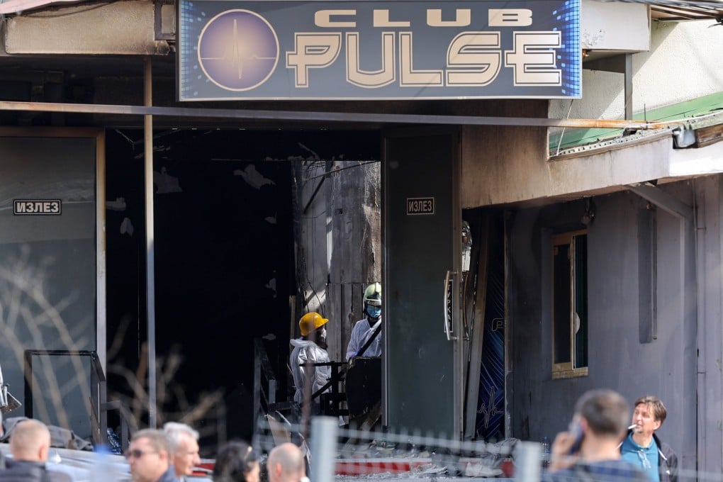 Investigators work outside a nightclub in Kocani, North Macedonia, on Sunday following a fatal fire. Photo: via EPA-EFE